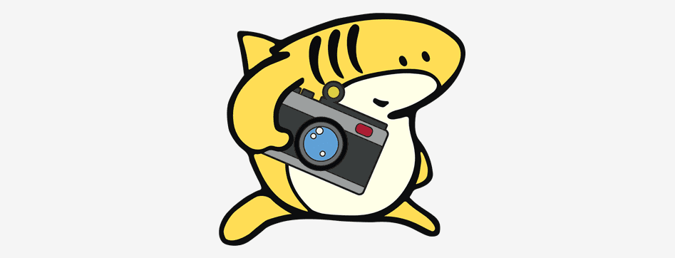 A picture of a yellow cartoon shark holding a camera